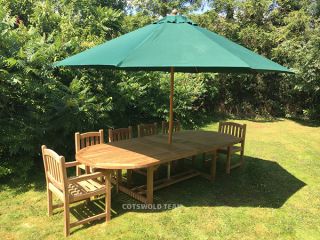Avon 10 Seater Extending Oval Teak Table 240cm with Malvern Chairs.
