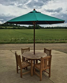 Churn 4 Seater Round Teak Table 120cm with Grisdale Side Chairs.