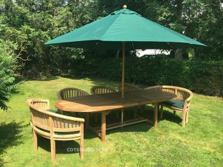 Avon 10 Seater Extending Oval Teak Table 240cm with Crummock Chairs and Crummock Benches.